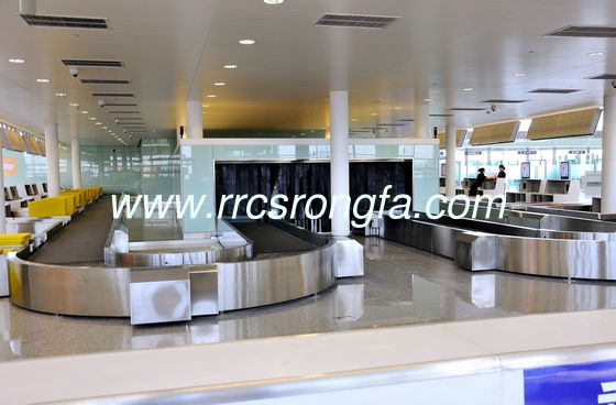 Baggage reclaim carousel. flat carousel. flat plate carousel. plane baggage carousel. horizaontal claim conveyor